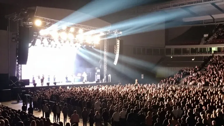 Illustration for: Dublin Arena Fills as Macklemore Launches Benefit Series After Sheeran Split